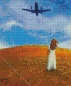 Woman in Field Looking Up at an Airplane Diamond Painting